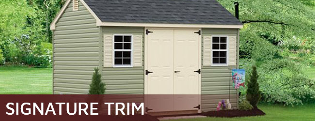 Vinyl storage shed with signature trim