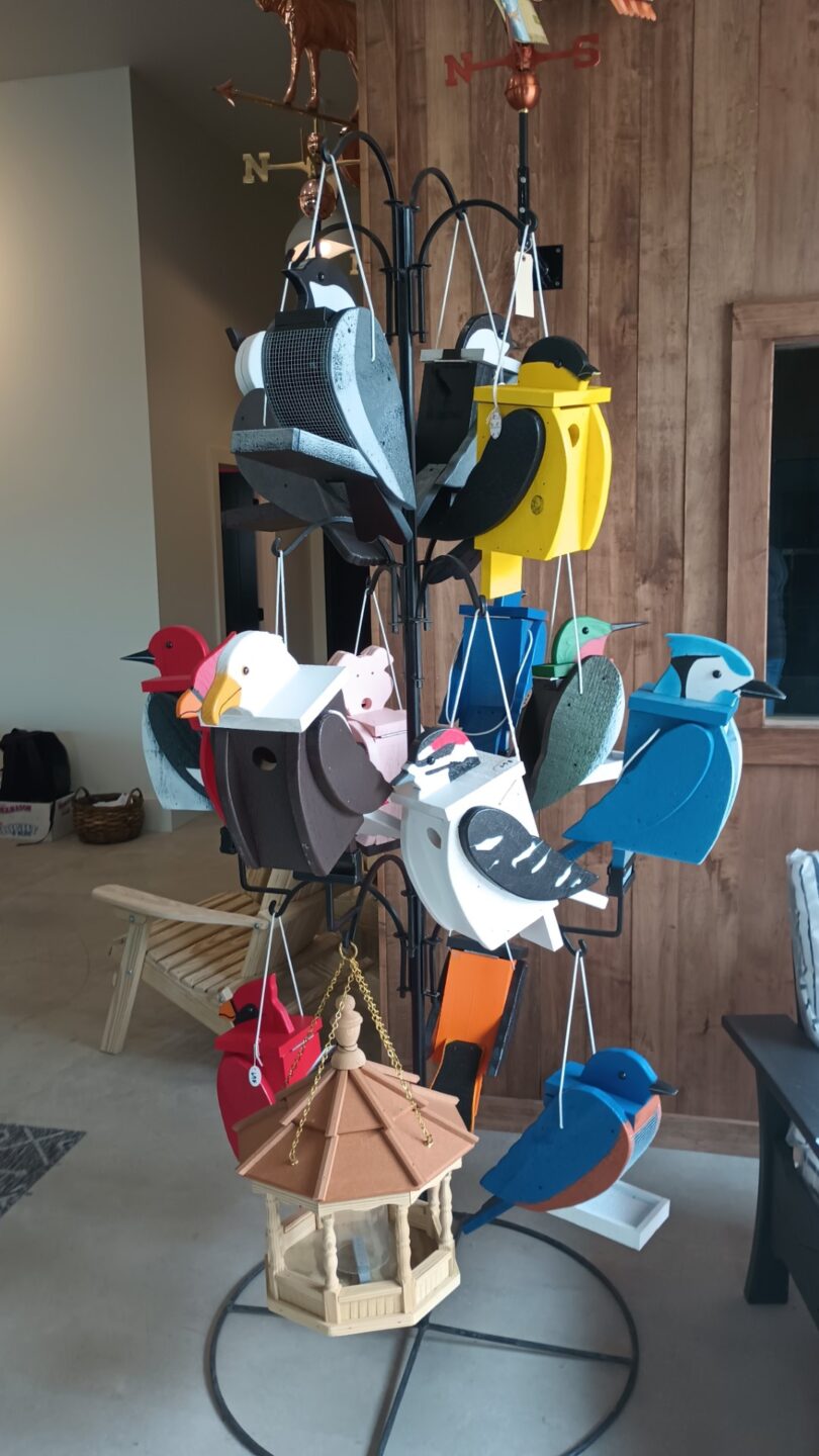 Colorful animal birdhouses and feeders