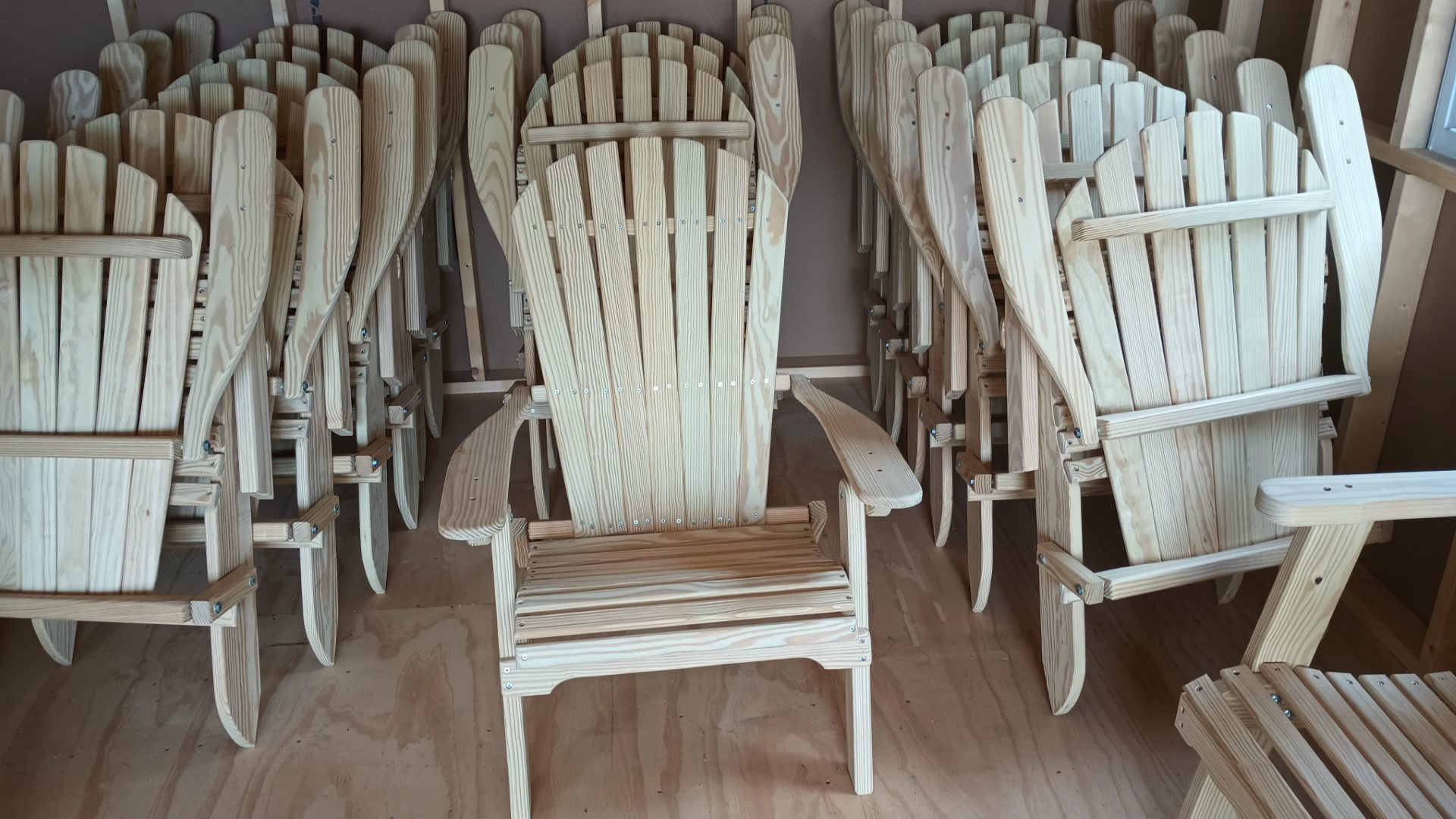 Stack of wooden folding chairs
